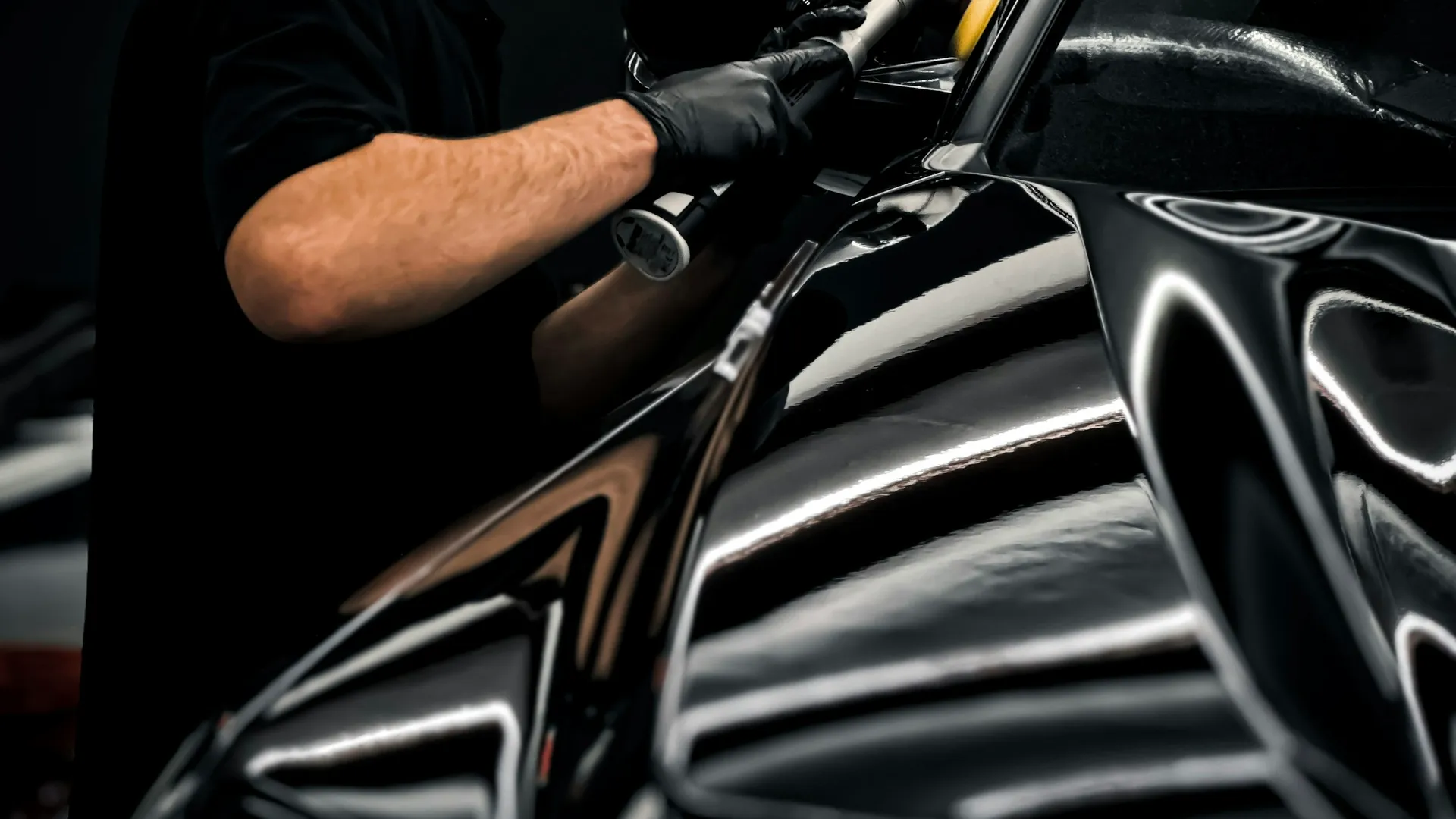 Machine polishing black car paintwork Porter's Car Detailing Loughborough
