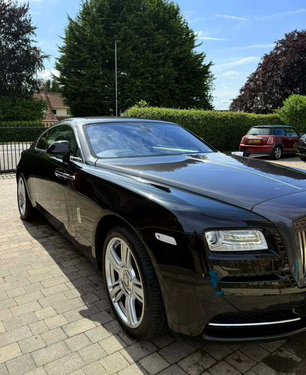 Ceramic coated black Rolls-Royce with a high gloss finish Porter's Car Detailing Seagrave